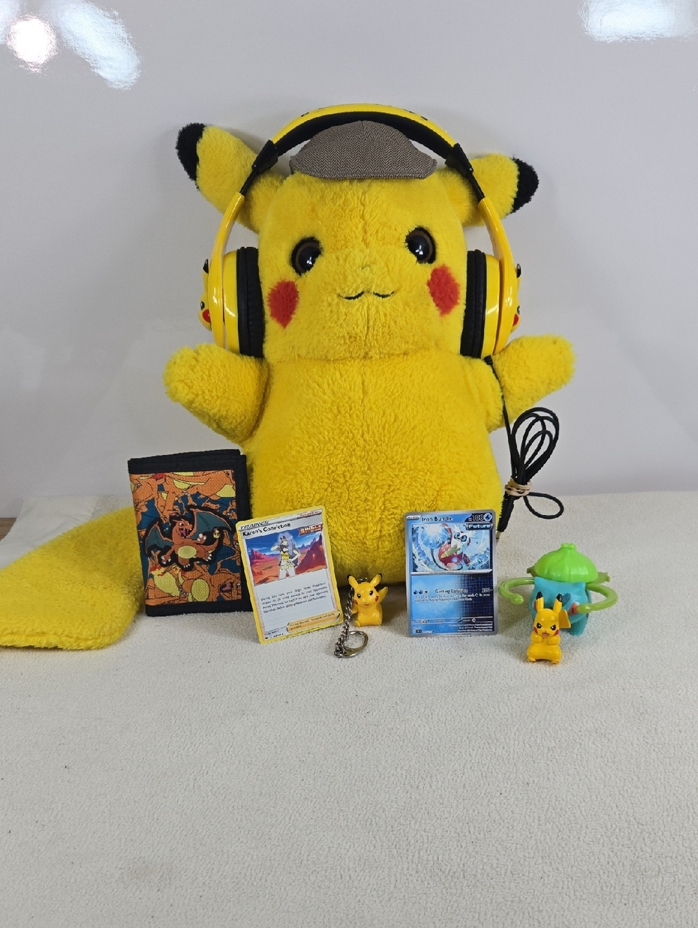 Detective Pikachu Plush with Headphones & Assorted Pikachu Collectibles - Yellow